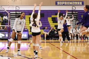 Photo by John Fisken
The Oak Harbor varsity girls volleyball team celebrates after winning a point against Edmonds on Nov. 3. (L-R) Jiana Alcaraz-Carter (sophomore, middle blocker), Karen Salinger (sophomore, outside hitter), Jasmine Phillips, (junior, right side hitter), Mia Carman (senior, libero).