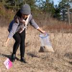 U.S. Navy photo by Mass Communication Specialist 3rd Class Jacquelin Frost
Volunteer Melissa Sincere spreads the seeds of rare native plants.
