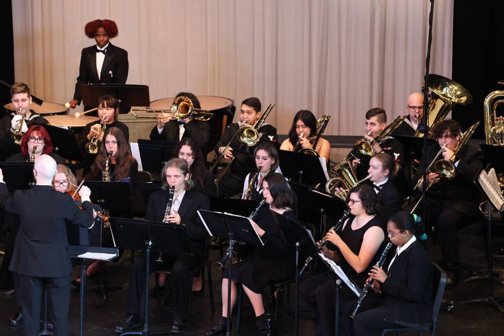Photo by John Fisken
The Oak High School Band performs Armed Forces Salute at the Oak Harbor Community Veterans Day ceremony Friday.