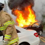 A fatal accident the afternoon of Dec. 18 near Clinton ended with one of the cars involved bursting into flames. The driver of the fully engulfed car was outside of the vehicle by the time first responders arrived at the scene. (Whidbey News-Times/Submitted photo)