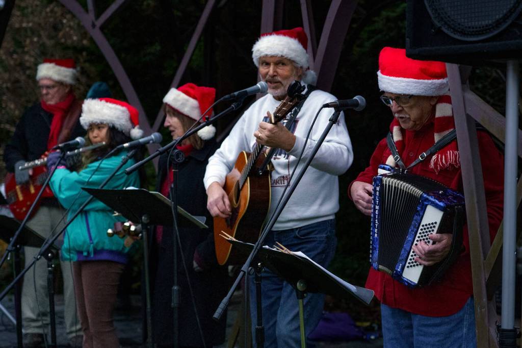 Photo by David Welton
From left, Ron Rossel, Katyrose Jordan, Deb Lund, Karl Olsen and Vern Olsen play music during the event.