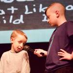 Photo by Rachel Rosen/Whidbey News-Times
Cillian Burke interviews various castmembers throught the play, usually about food. Owen Brannon fields a question.