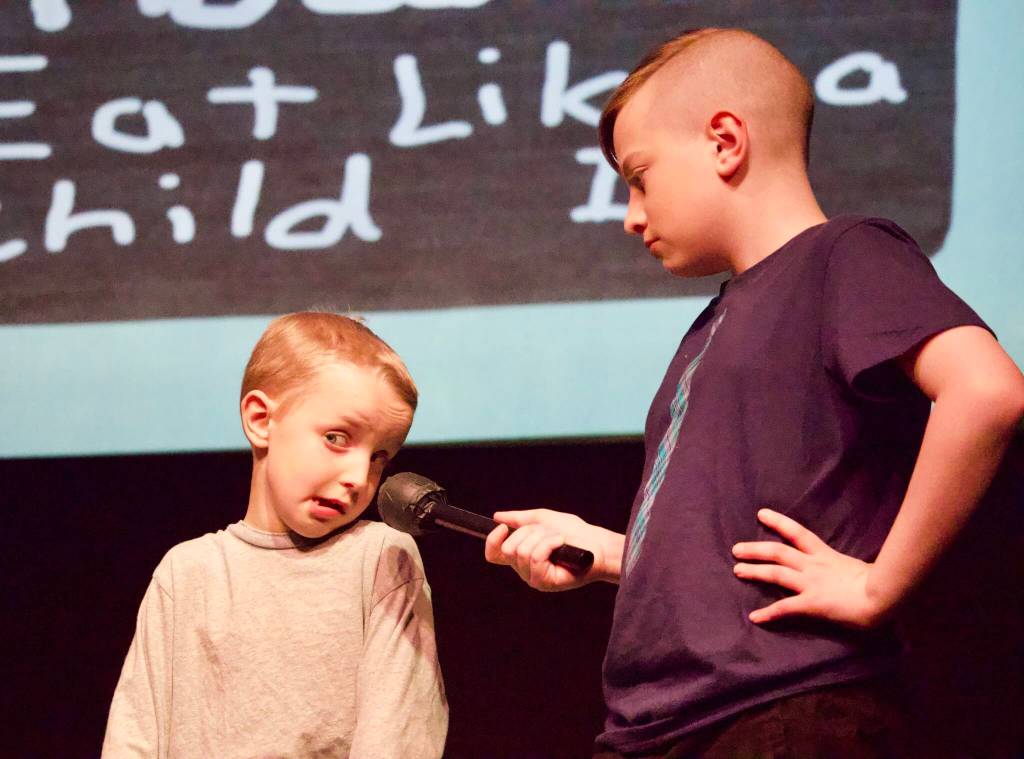 Photo by Rachel Rosen/Whidbey News-Times
Cillian Burke interviews various castmembers throught the play, usually about food. Owen Brannon fields a question.