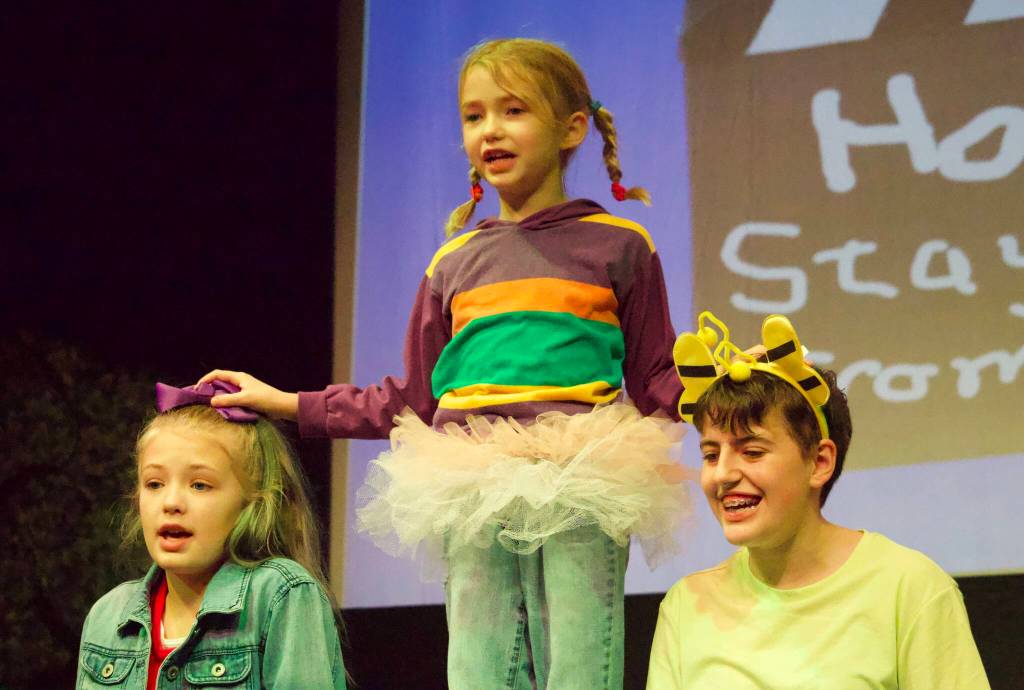 Photo by Rachel Rosen/Whidbey News-Times
From left, Charlianne Eller, Andilynne Eller and Isabelle Tucey sing a song called I Feel Sick in a vignette about how to stay home from school.