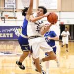 Photo by John Fisken
Oak Harbor athlete Xavier Ochoa takes a shot at a Dec. 2 game agaisnt La Conner. Oak Harbor defeated La Conner 73-44 in the first game of the season.