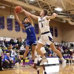 Photo by John Fisken
Oak Harbor athlete Taylen Bader attempts to steal the ball at a Dec. 2 game agaisnt La Conner. Oak Harbor defeated La Conner 73-44 in the first game of the season.