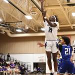 Photo by John Fisken
Oak Harbor athelte Shane Warden shoots the ball at a Dec. 2 game agaisnt La Conner. Oak Harbor defeated La Conner 73-44 in the first game of the season.