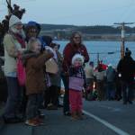 Photo by Karina Andrew/Whidbey News-Times
Paul Stanwood, age 6, and Riley Merryman, 3, eagerly await the appearance of Santa Claus in the Coupeville parade.