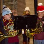 Photo by Rachel Rosen/Whidbey News-Times
French hornists Sean Brown and Ethan Brady play Christmas songs in downtown Oak Harbor.