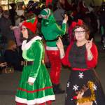 Photo by Rachel Rosen/Whidbey News-Times
Two elves precede Santa and Mrs. Claus during Oak Harbors Christmas parade.