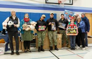 Photo provided
Volunteers with a number of donated toys.