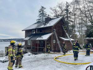 Photo by South Whidbey Fire/EMS
Below freezing temperatures on Thursday complicated firefighting efforts.