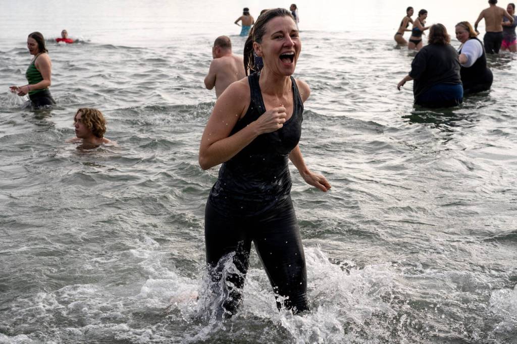 Photo by David Welton
People of all ages rang in the new year by taking an icy dip in the waters of Double Bluff Beach in Freeland on New Years Day. A total of 158 participants registered for the annual Polar Bear Dive event, from the ages of 4 to 79.