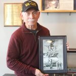 Photo by Karina Andrew/Whidbey News-Times
Former VA-115 member Rod Maskew gifts a painting he found of the last U.S. air crew lost in the Vietnam War to NAS Whidbey Island.