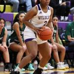 Photo by John Fisken
Oak Harbor athlete Ashley Hinds surveys the court at a Jan. 13 game against Mount Vernon. The Oak Harbor girls varsity team defeated Mount Vernon 50-49. The team is now 7-5 overall this season.