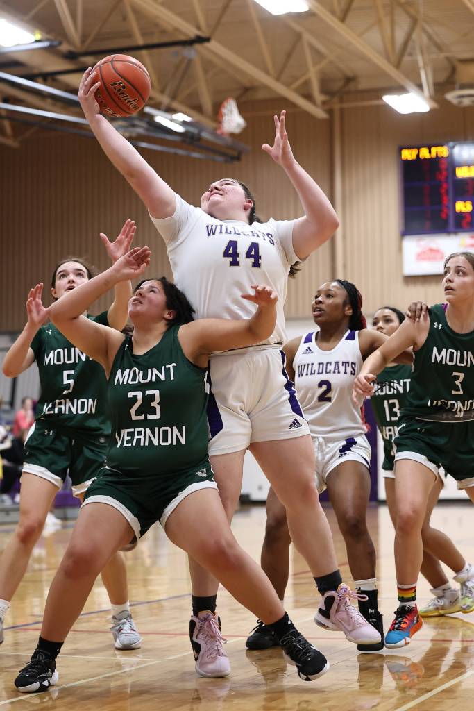 Photo by John Fisken
Oak Harbor athlete Grace Odeneal rises above the rest at a Jan. 13 game against Mount Vernon. The Oak Harbor girls varsity team defeated Mount Vernon 50-49. The team is now 7-5 overall this season.