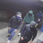 A group of teenagers in masks were caught on video trying to break into an Oak Harbor shop. (Provided by Oak Harbor police)