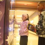 Photo by Karina Andrew/Whidbey News-Times
Cristal Hernandez Cruz, left, and Trenton Miller select books from the vending machine at Crescent Harbor Elementary School.