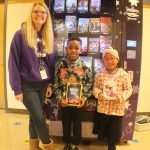 Photo by Karina Andrew/Whidbey News-Times
From left, Glenda Jackson, Trenton Miller and Cristal Hernandez Cruz enjoy the book vending machine, new to Crescent Harbor Elementary School this school year.