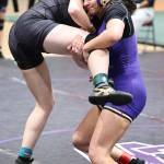 Photo by John Fisken
Oak Harbor athlete Kayla Bodenhafer (right) in a match at the sub-regional tournament Feb. 3. Bodehafer placed 7th in her weight class and will compete as an alternate in regionals.