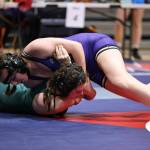 Photo by John Fisken
Zoe Beeman pins an opponent at the sub-regional tournament Feb. 3. Beeman placed second in her weight class and qualified for the regional tournament Saturday.