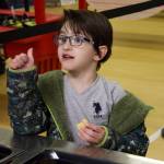 Photo by Rachel Rosen/Whidbey News-Times
Logan Paradesi approves of mashed radishes, the produce featured in Februarys Harvest of the Month.