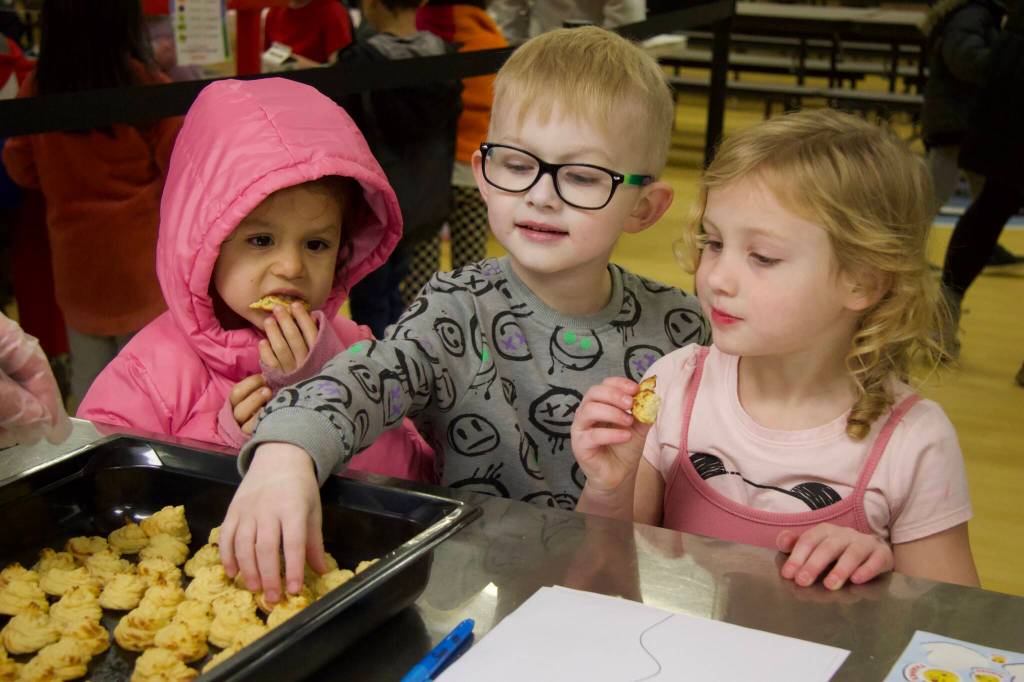 Photo by Rachel Rosen/Whidbey News-Times
From left, Penelope Williamson, Robert Buelow and Evelyn Coleman try Februarys Harvest of the Month.