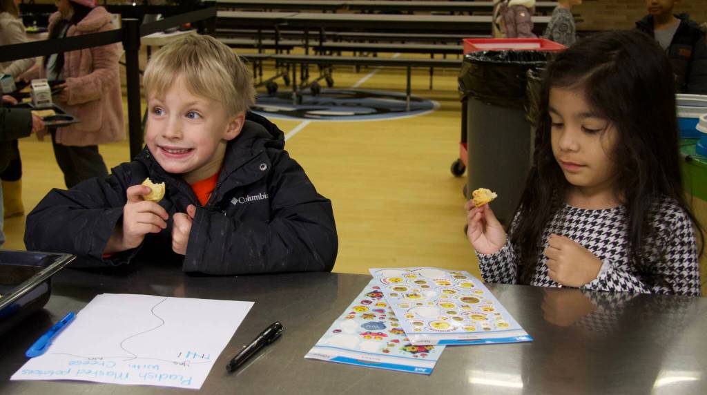 Photo by Rachel Rosen/Whidbey News-Times
James Sisung, left, enjoys his mashed radishes.