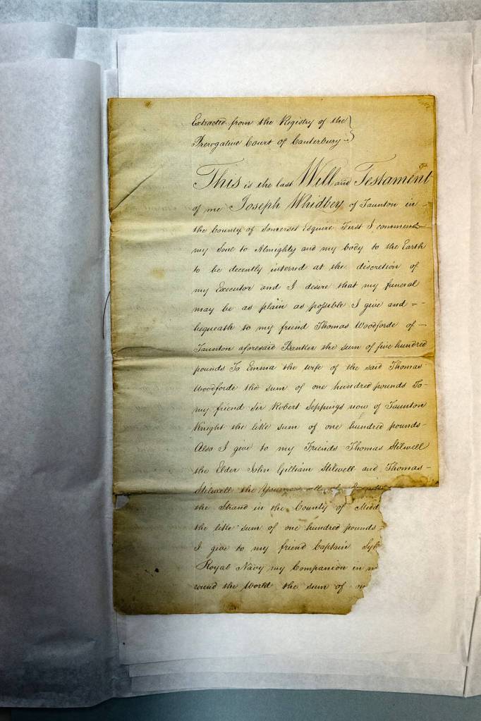 Photo by David Welton
Whidbeys will is written in impeccable cursive. Some pages are missing chunks at the bottom right hand corner, like this one.