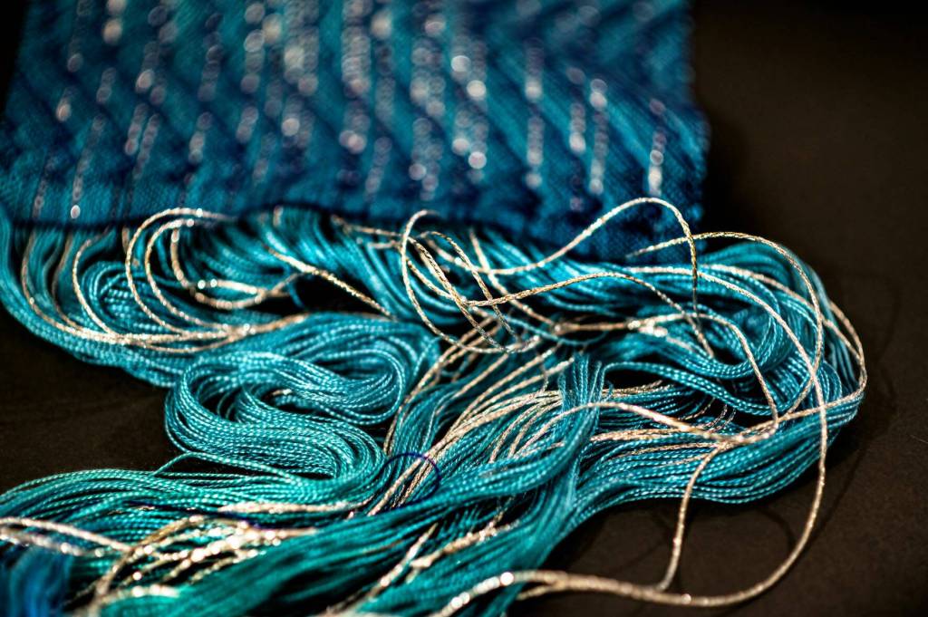 Photo by Dennis Browne
Silver lends a pop of color to the storycloth, representing the graying hair of aging seniors.