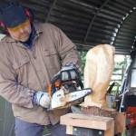Photo by Rachel Rosen
Ted Boesch carves an owl sculpture.