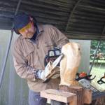 Photo by Rachel Rosen
Ted Boesch carves an owl sculpture.