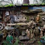 Carvings and other fixtures cover the wall and fence around the property in Clinton. (Olivia Vanni / The Herald)
