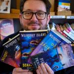 Photo by David Welton
Derrick Sutton  also known as Eldritch Black  is the author behind the Weirdbey Island books. The strange, eerie series for kids is ongoing and currently has five books.