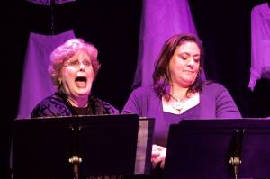 Photo by Rachel Rosen/Whidbey News-Times
From left, Gaye Litka and Katie Jones. Litka plays Gingy who shows sketches of dresses shes worn in her life throughout the play.