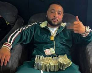 Courtesy of FBI
Federal agents obtained a selfie photo of Bryce Hill with piles of cash through a search warrant of his phone.