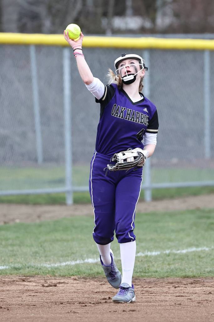 Photos by John Fisken
Oak Harbor athlete Haylee Burleigh competes in a varsity softball game March 10. The Oak Harbor High School Wildcats played both the Coupeville and South Whidbey high school softball teams at the annual Jamboree event.