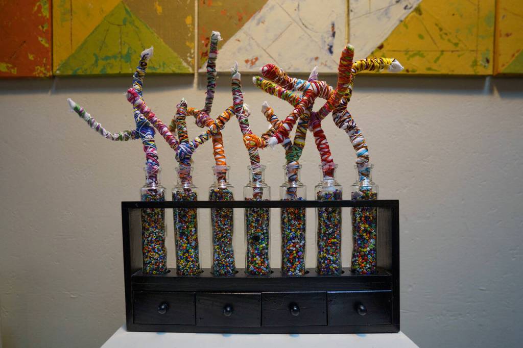 The Celebration is a colorful work by Joan Green.