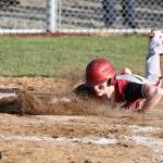 Coupeville High School freshman Aiden ONeill, slides into a base during a game against South Whidbey High School March 15. Coupeville beat South Whidbey 13-2 in the baseball season opener.