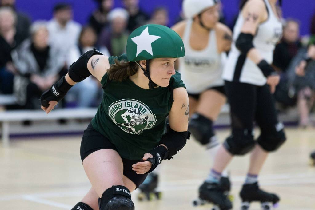 Whitni Wild Sockeye Schurr skates in a Whidbey Island Roller Derby bout March 11.