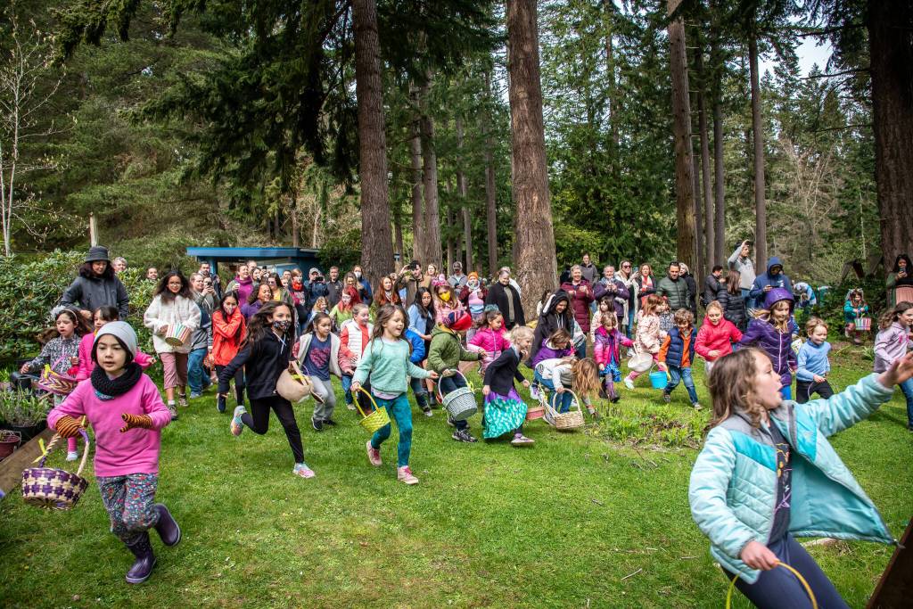 Kids search for Easter eggs during a hunt last year at Meerkerk Gardens. (Photo provided)