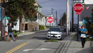 Photo by Rachel Rosen/Whidbey News-Times
Two pedestrians walk through downtown Oak Harbor.