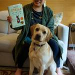 Jane Fung read How Stella Learned to Talk, a 2021 memoir and how-to guide written by a speech pathologist who discovered her dog could learn the same button-pressing form of communication that she taught children how to use. (Photo by David Welton)