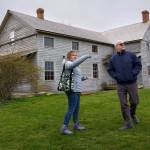 Ebeys Landing National Historical Reserve manager Marie Shimada shows Rep. Rick Larsen around the historic Coupeville Ferry House property during a visit to the island April 6. (Photo by David Welton)