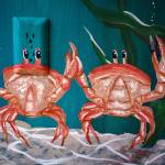 Dancing crabs holding mussels as castanets are part of Carly Sarvers mural.
