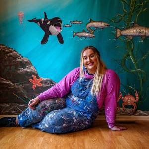 Photos by David Welton
Carly Sarver is the artist behind a brand-new mural depicting the marine wildlife of the Salish Sea. South Whidbey resident John Knowlton commissioned the Stanwood muralist to paint what was formerly an accent wall in his new home.
