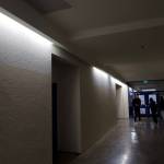 The second floor corridors of the high school/middle school are dimly and sparsely lit. (Photo by David Welton)