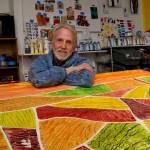 Louie Rochon is an abstract impressionist painter who first opened his studio in Clinton about four years ago. (Photo by David Welton)