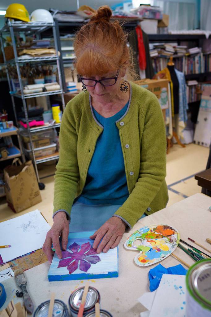 Melissa Koch is a mixed media artist who uses repurposed materials in her work. (Photo by David Welton)