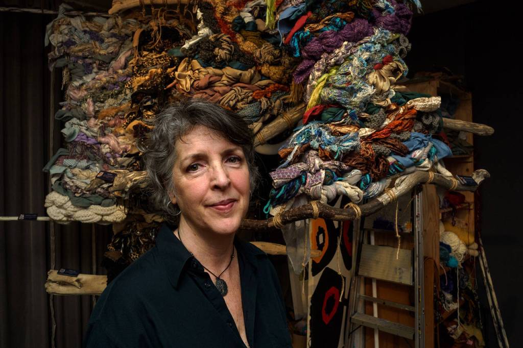Sandy Rubini-Rochon is a textile artist who likes to use different yarns, scarves and other materials in her work. (Photo by David Welton)